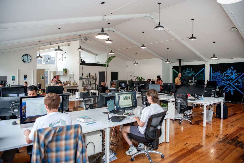 Image showing dedicated desk use in The Workshop coworking spaces in Auckland.